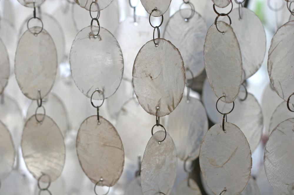 Suncatchers may be incorporated into wind chimes for a visual as well as auditory affect.