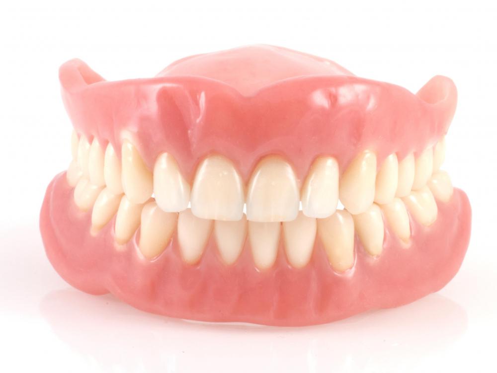 Make false teeth white