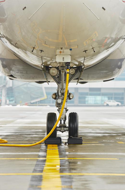 An aviation inspector will look for signs of damage, corrosion, or wear on the landing gear.