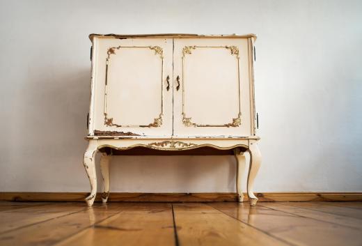 Antique and vintage furniture retains more value when restored to its original appearance.