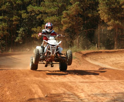 An ATV is a vehicle designed for use on all types of terrain, including grass and dirt.