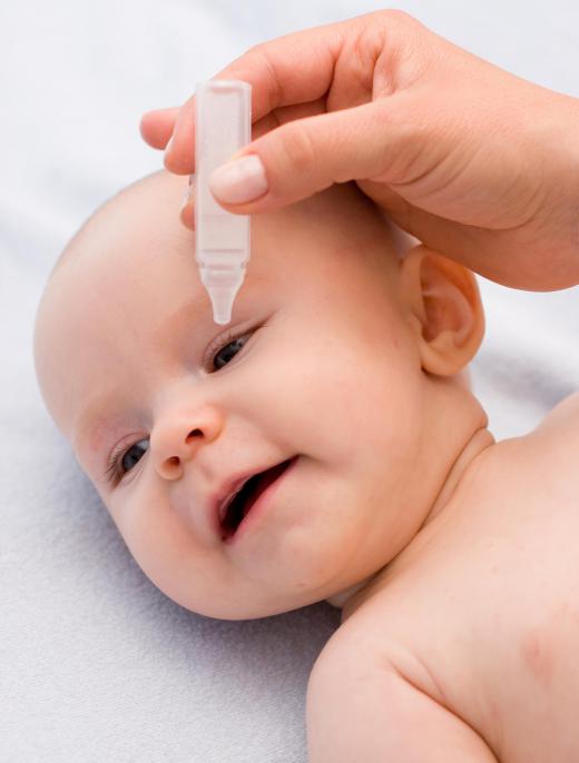 A pediatric ophthalmologist might use eye drops to treatan infant's eye problem.