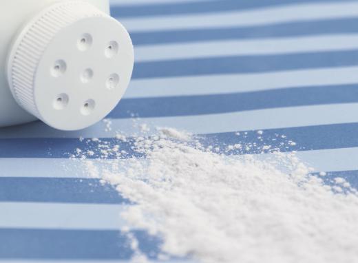 A parent should shake baby powder onto his or her skin before applying to a newborn.