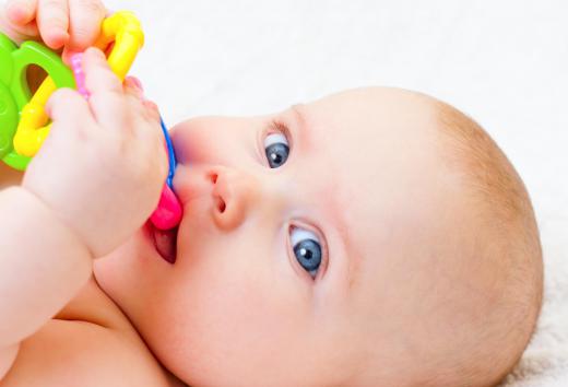 A cold teething ring can numb teething pain, making feeding easier.