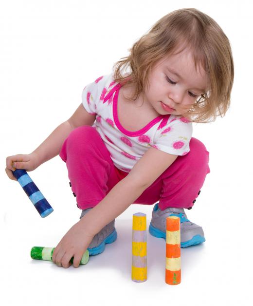 Even toddlers can be taught to put away their toys when they are done playing.