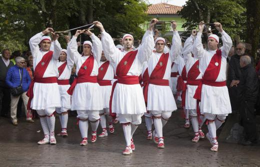 The Basques have maintained unique customs, including a non-Indo European language, despite being surrounded by a dominant Spanish culture.