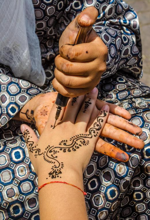 Arabic mehndi are temporary tattoos applied with henna.