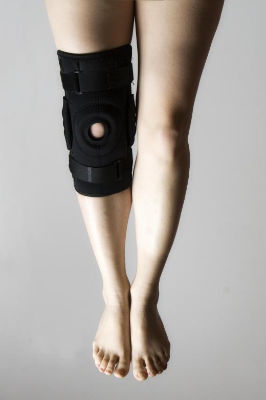 A person wearing a knee brace.