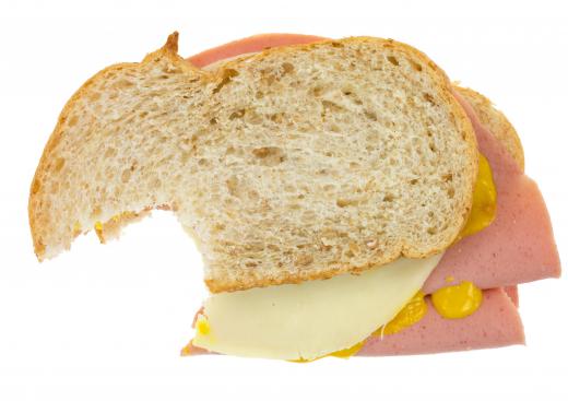 Bringing deli sandwiches can help cut down food costs during a road trip.