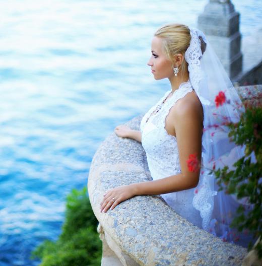 A photography student may gain work experience by shadowing a wedding photographer during a wedding.