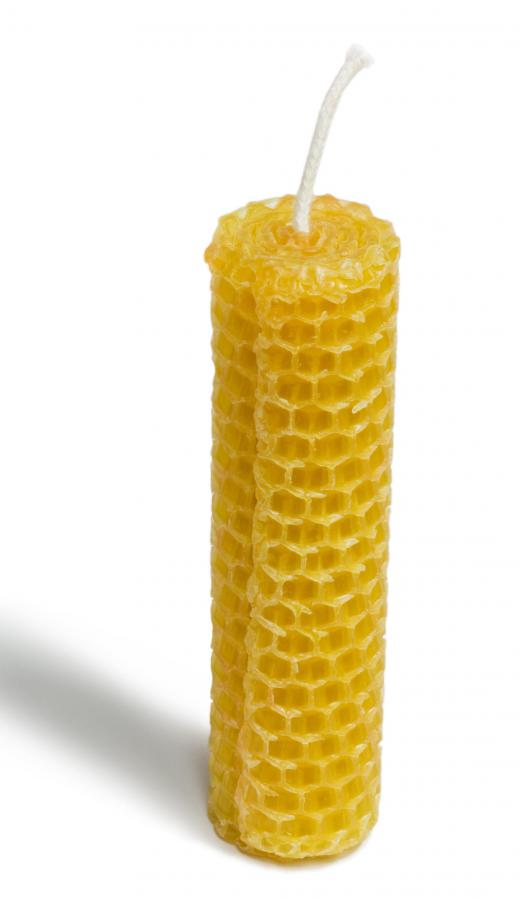 Making and selling beeswax candles at flea markets is a low-investment business idea.