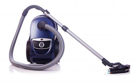 A house vacuum utilizing a vacuum hose.