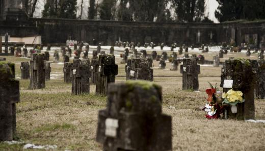 Each gravestone in a cemetery memorializes the person buried in that particular spot.