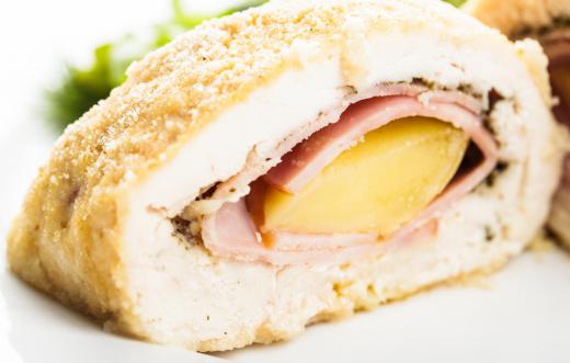 A popular stuffed chicken thigh meal is chicken Cordon Blue, which has a ham and Swiss cheese filling.