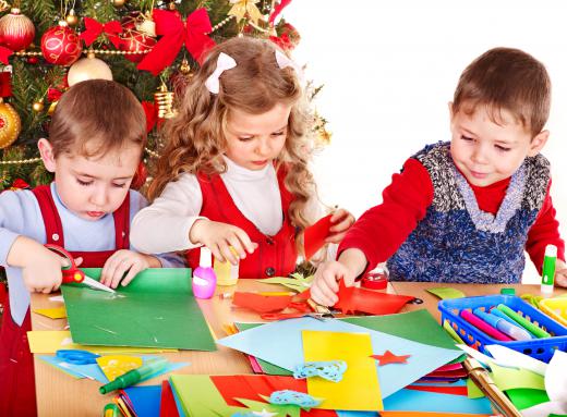 Children enjoy making handmade Christmas decorations.