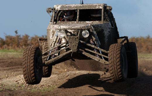 Mud tires are often seen on specialized vehicles, like a dune buggy.