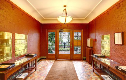 Tables could be used to keep a large entryway organized.