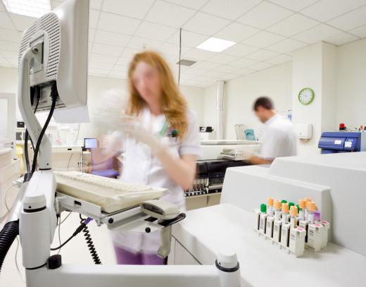 Some health industry employees work behind the scenes, such as in laboratories.