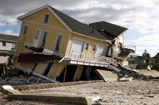 Emergency triage personnel help people injured during a natural disaster.