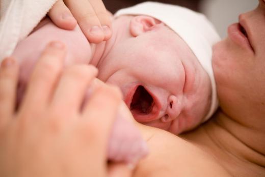 Colicky babies may be soothed by skin to skin contact.