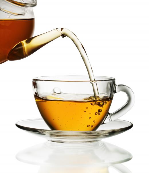 Five cups or more of green tea per day is considered too much.