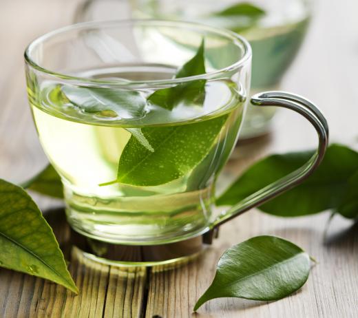 Green tea typically includes herbs which help the body purge fluids and solids.