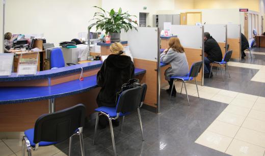 Some cubicles, such as those used at banks, may be little more than dividers.