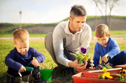 A child of virtually any age can earn money by planting and selling flowers.