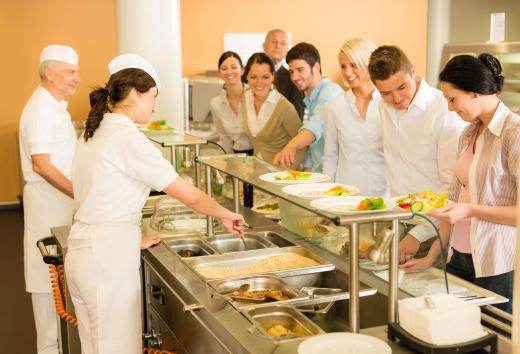 Food servers might work in cafeterias.