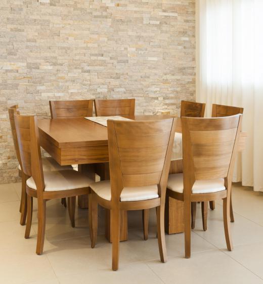 A wooden dining set should be cleaned with an oil-based soap and a damp cloth.