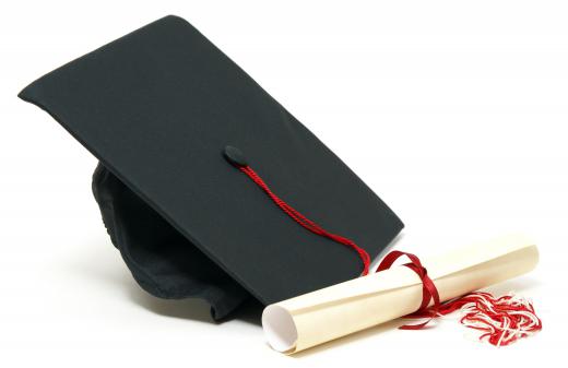 A mortarboard and diploma for an associate's degree in interior design.