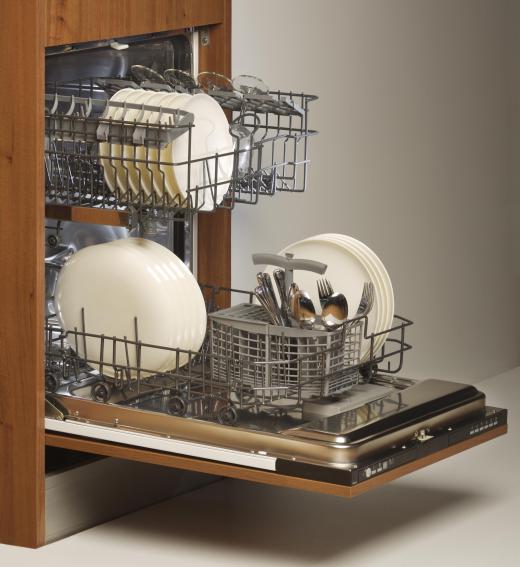 In a small household a traditional dishwasher may be wasteful of water and energy.