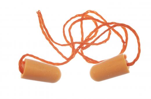 Ear plugs can help prevent trauma from loud noises such as those from factory machines, which over time can cause hearing loss.