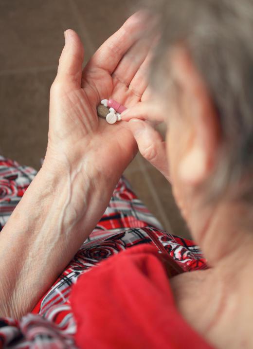 Pill dispensers can help elderly patients recall if they have already taken their medication that day.