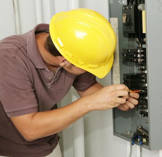 An electrician may be tasked with establishing the wiring for a building.