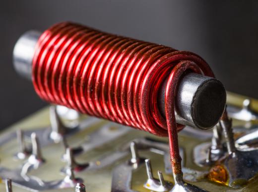 A small electromagnet. An electromagnet and power supply are part of a vibrating sample magnetometer.