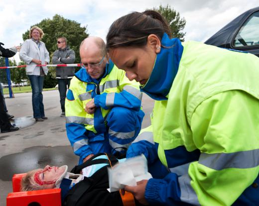 Patients with possible spinal injuries are placed on a padded backboard.