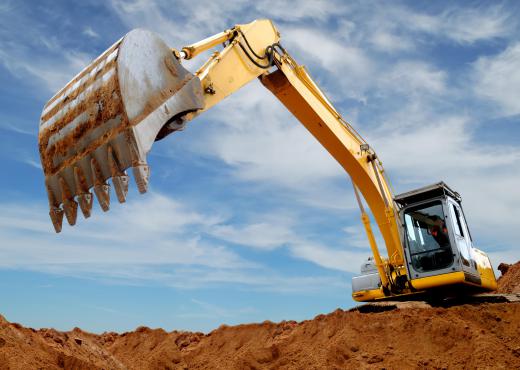 A company with a solid credit history may take out business loans to acquire heavy equipment like excavators.