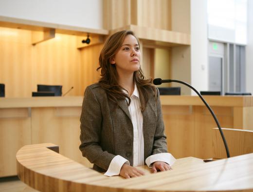 Individuals in a court room are required to follow courtroom etiquette, including dressing conservatively.