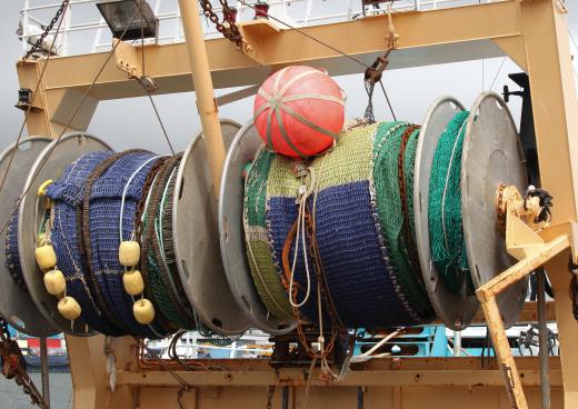 Commercial lobster boats have pulley systems that allow traps and buoys to dropped into the water and retrieved again.