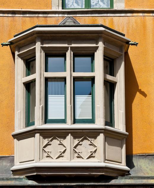 Curved curtain ceiling tracks work well for bay windows.