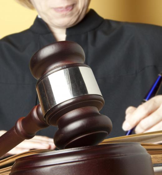 Cases in a court of law are decided by a judge or jury.