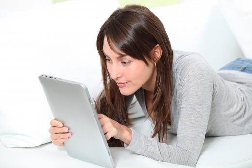 A woman taking a Bible distance learning class.