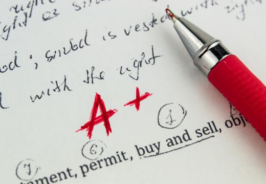 Grading papers in red ink can be perceived as negative.