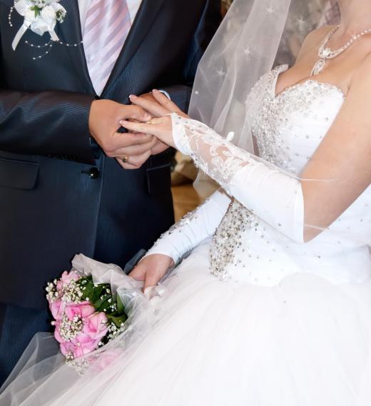 The bride traditionally tosses her bouquet after she gets married for one of the women at her reception to catch.