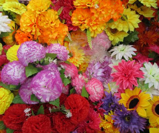 Wedding arches may be decorated with different flowers chosen by the couple.