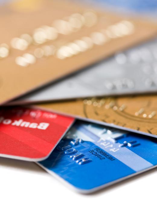 Paying off credit cards can help improve a credit score.