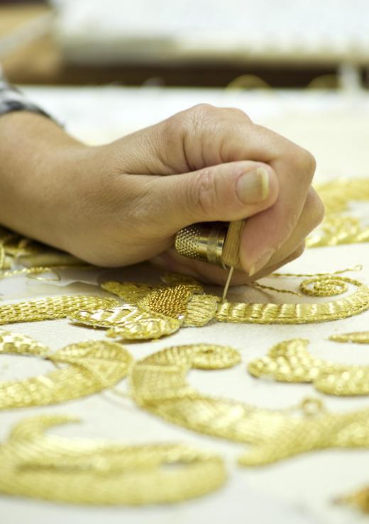 Goldwork uses metal thread as part of the design.