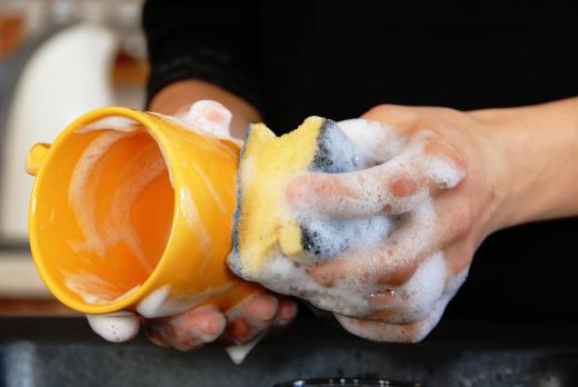 Washing dishes is a common chore for children.