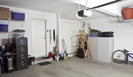 Make-shift bookshelves can come in handy when organizing a garage.